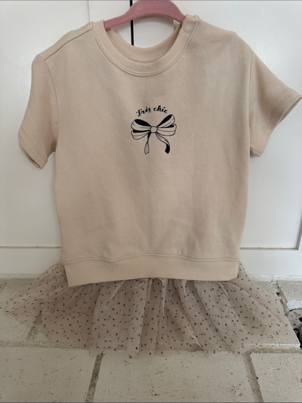 H&M Cream Short Sleeve dress with Navy Bow Graphic and 'très chic'